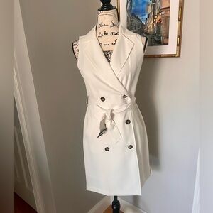 Banana Republic ivory button, belted dress with classic styling. Versatile!
Sz 4